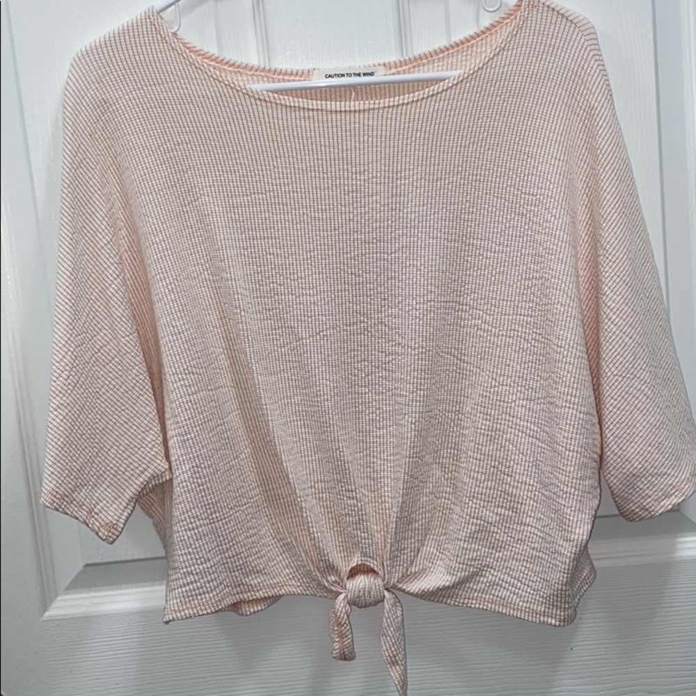 super cute light pink shirt